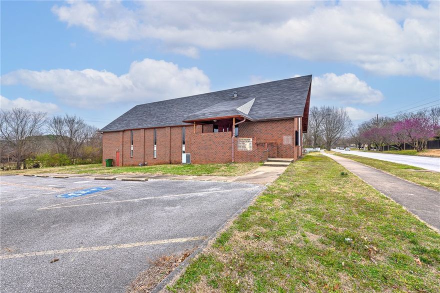 What a great location next to Gulley Park in Fayetteville AR.  This existing Church has a huge foot print of 8000+ sq.ft. and sits on 1.29 acre lot.  There is a great opportunity to here to do something great with this building and location.  Either update and continue as a church or turn into something else.  The building is as solid as it comes.