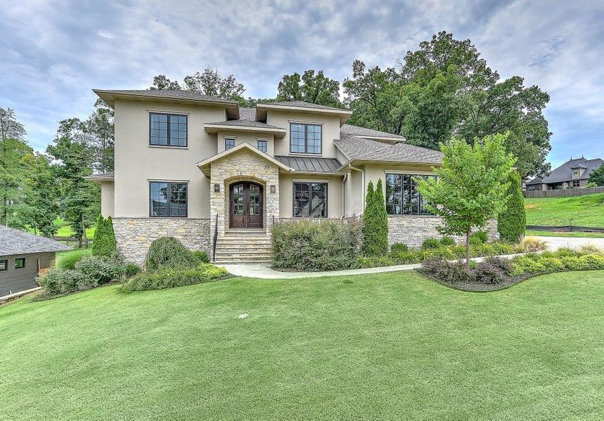 Stunning David Harris custom built masterpiece with backyard oasis and views of the golf course!  Fabulous amenities with spacious open floor plan featuring a gourmet kitchen, formal dining, formal living, upstairs bonus, open living room & breakfast that walks out to private pool and outdoor kitchen!  Guest suite on main level!