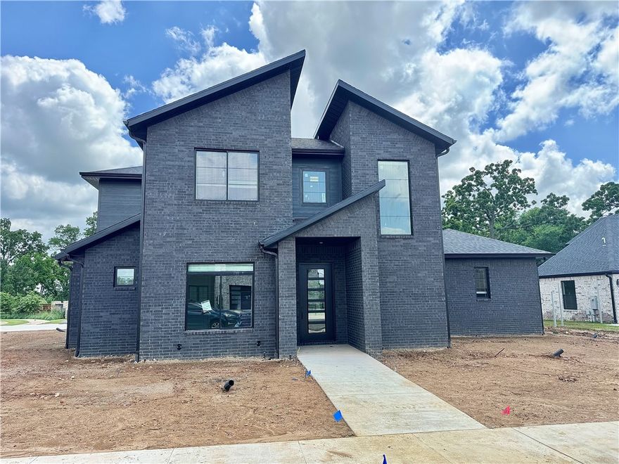 New construction modern home with gorgeous exterior in sought after community of Aurora. Enjoy the stunning living room with tiled linear fireplace, crown molding, engineered wood flooring, tons of light streaming through ample amount of windows and open floorplan. Kitchen features large custom stained island, quartz countertops, pot filler, stainless steel appliances, gas cooktop, custom cabinets, double ovens and massive walk in pantry! Home also features a secondary bedroom on the main level. Private primary bedroom with custom beams and luxurious ensuite bathroom. Primary bath with double sinks, storage, walk-in tile shower and stand alone soaking tub. Upstairs features two large bedrooms and bonus room. Upgraded accordion door leading to a huge covered patio overlooking the large corner lot! Aurora residents have access to TONS of community amenities. Adult pool, family pool, bike repair station, dog park, elevate fitness course, sports court, open air clubhouse & playground! Internet included in POA!