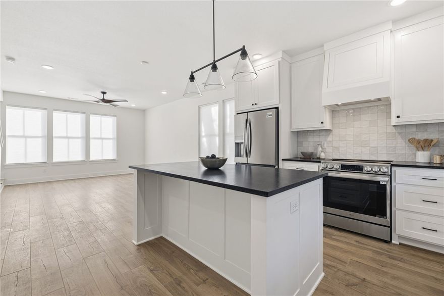 The Brookline Townhomes are here! These beautifully designed new townhomes join traditional architecture with modern construction, stylish finishes, and contemporary amenities. Each unit features a private one-car garage equipped with a 220V outlet for EV charging. Just inside, a heated and cooled flex space offers the perfect spot for a home office or creative studio. An open-concept kitchen and living area is filled with natural light, with a convenient half bath nearby. The spacious bedroom suite includes a built- in desk nook, oversized walk-in closet, and sleek full bath with walk-in shower. These townhomes are built to be highly energy efficient: perfect for those seeking a low-maintenance lifestyle and convenience. Located just minutes from the University of Arkansas and the Arts & Entertainment District, these homes provide close proximity to Fayetteville’s best attractions. See today why the Brookline Townhomes offer a unique opportunity for private, connected living in a vibrant community.