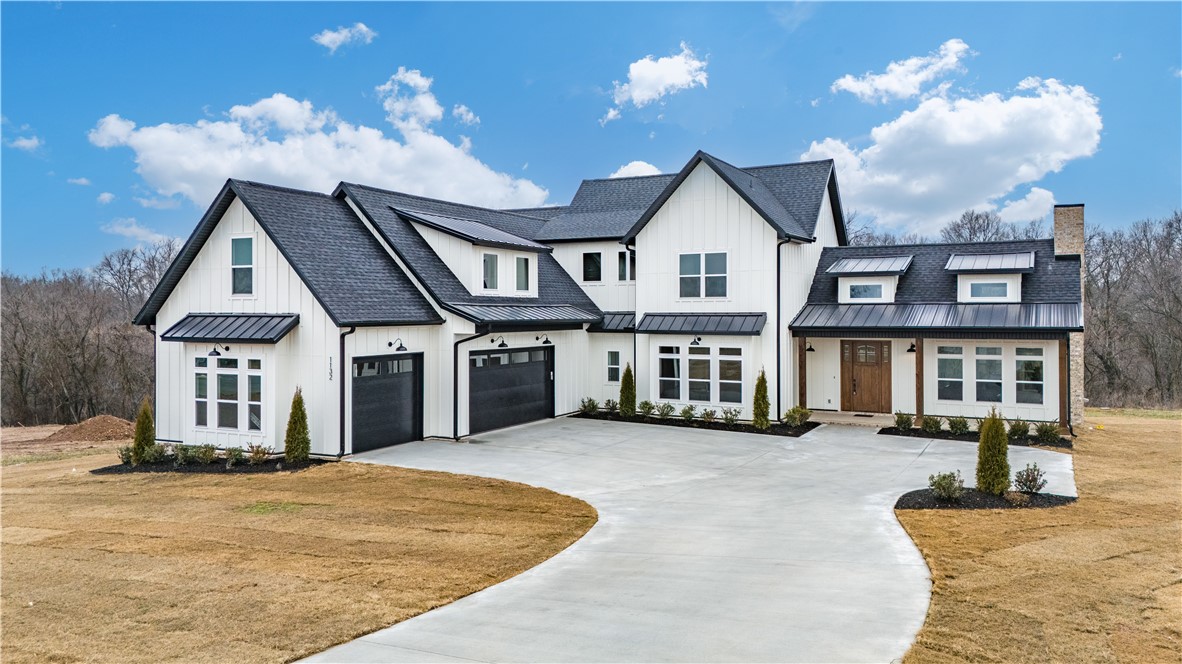 This truly custom home is now available, featuring an open floor plan with soaring ceilings, all hardwood floors, 2 kitchen islands, tons of storage, 4 bedrooms, 3.5 baths plus an office, a second living space and large bonus room. Situated in a quiet cul-de-sac with partial river views on a 1 acre lot with wooded common space behind giving you lots of privacy. Nothing was overlooked in the construction, tons of custom trim work, oversized 3 car garage, irrigations system, and so much more. Book your showing today. Seller offering $10,000 towards closing cost.