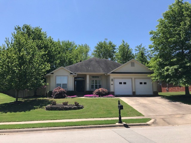 Partially updated home with newer paint & carpet. 3 bedrooms, 2.5 baths, 2 living areas, newer stainless appliances including refrigerator & 2 car garage. Refrigerator, curtains and washer & dryer can stay if needed. Master suite with large walk-in closet. Extensive landscaping with backyard creek & patio/deck. Hot tub transfers and needs new filter and cleaning but works. Located within 1 block of Vandergriff Elementary, McNair Middle & St. Joseph's Catholic School. 2 blocks from restaurants & shopping. Great home near schools!