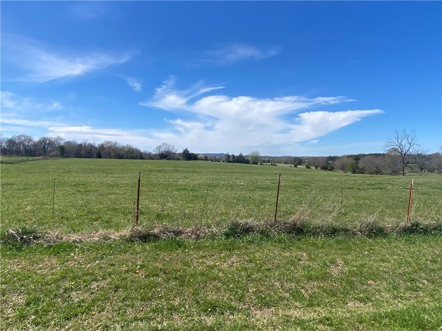 Outstanding investmant property,new home sites or farm just off highway 412 just west of Huntsville Arkansas only 20 minutes to Fayettville AR and Springdale AR 35 minutes to Rogers AR. Located in the county of Madison in Northwest Arkansas . This property has lots of potential with many home sites with several fenced pastures ,ponds and a spring. The property has electricity ,rural water,natural gas,fiber optic, highway frontage and a new survey. Dont miss this beautiful property with a great location.