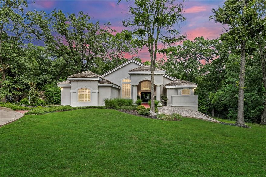 Breath-taking, one-of-a-kind home located in the heart of Bentonville on 1.39 acres! Come see this true classic in one of Bentonville’s most sought-after neighborhoods. Unbeatable location offering direct access to Bentonville’s world-class trail system and only minutes from Downtown Bentonville. Gourmet chef’s-kitchen featuring top-of-the-line gas cooktop, double oven, & large center island & prep sink. The master suite is a tranquil retreat, offering a generous space to unwind and relax. The en-suite bathroom boasts a spa-like atmosphere with a soaking tub and a brand-new tiled shower. The home offers three additional bedrooms on the main level. Private, walk-out basement is also a 5th bedroom with a full bathroom. Step outside to the backyard oasis with tall, mature trees surrounding the inground pool with a private and serene setting, perfect for outdoor enjoyment and activities. Schedule a showing today and experience the allure and elegance firsthand. Your dream home awaits!