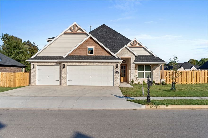 The Jennifer Plan, not yet built. This south facing home has 2,696 sq ft and is set for completion on approximately 9-25-26. Same plan with similar finishes. Pick your selections in our design center. Upon entering the foyer Step into a bright and inviting living room with vaulted ceilings and wood beams. The kitchen includes a walk-in pantry and a cozy breakfast nook. The primary suite is thoughtfully designed to offer privacy, featuring direct access from the master closet to the utility room. Also located on the main floor is a bedroom ideal for guests or a home office. Upstairs, you'll find two additional bedrooms with a shared full bathroom. 3-car garage and covered front and back patio and an outdoor wall gas fireplace. Preferred lender is offering up to $5K in lender credits. *Photos shown are of a finished home in the same plan.* Walk to nearby schools and just minutes to Downtown Bentonville. Introductory pricing for a  very limited time. Will go up soon, contract today.