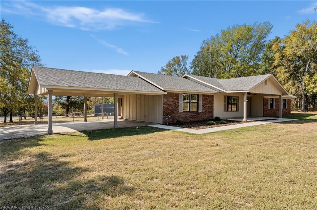What once was old is new again and better! Extremely well-built home with 6" walls. Home features split 4 B/R, 2 BA and tons of "new" down to the studs! New walls and ceiling sheetrock, bath fixtures, custom built kitchen cabinets by Specialty Woodworks with granite counter tops. New Frigidaire appliances, microwave, stove and dishwasher,COFFEE BAR, new hot water heater, new HVAC system w/gas heating. Beautiful luxury vinyl flooring in main living areas and carpet in bedrooms. Added Brand new 2 car carport & front porch addition. Additional 6" insulation. New roof shingles. For Him: 48x32 metal storage building. Also, a motor home canopy. Fenced backyard. Enjoy this nice peaceful country home on 1.81 acres! One more acre available option for the buyer! Close but far enough away to I-49.
