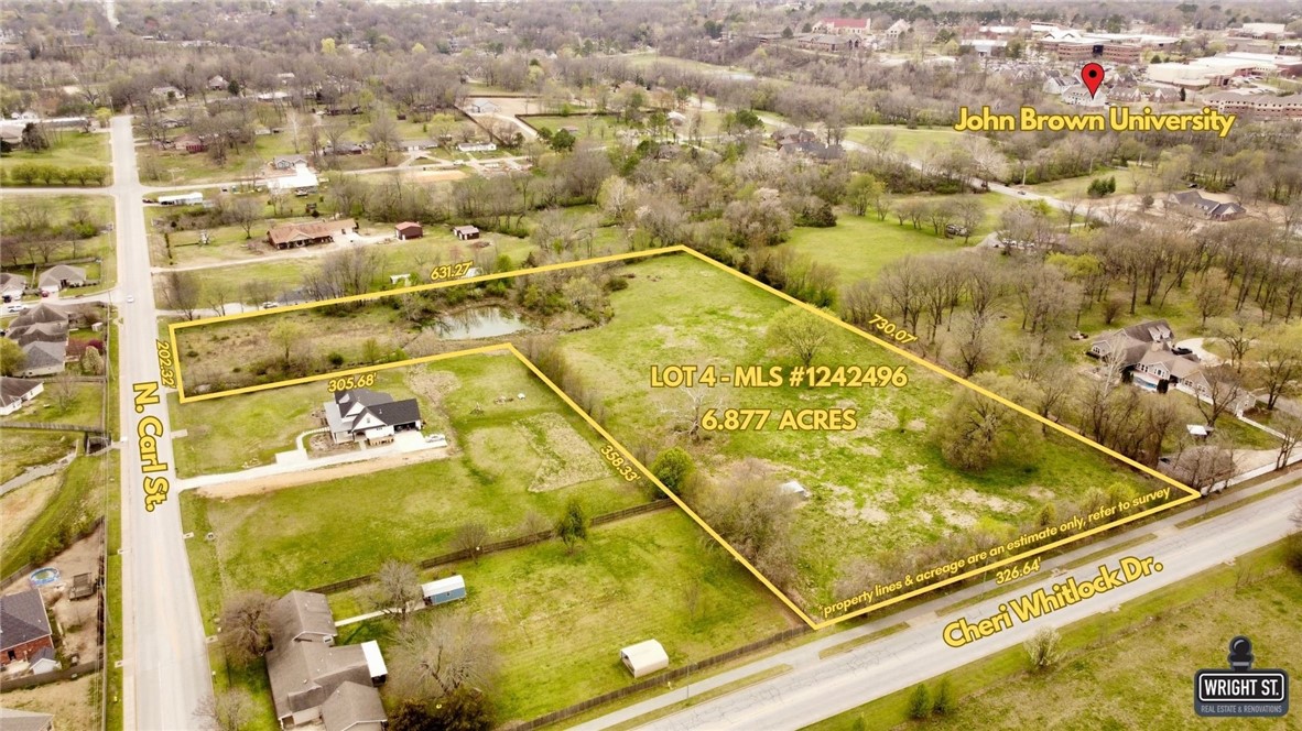 Rare find! BACK ON THE MARKET AT NO FAULT OF THE SELLER. This beautiful tract of land Zoned R2, "Neighborhood 1", is in the heart of Siloam, close to JBU, trails, downtown, schools, has year round pond/ stream, but plenty of flat land to build or develop. Would make an excellent home site, farm/pasture, or whatever you have in mind. Survey and lot split/ subdivision in process (see attachments), application submitted to divide this approximate this parcel, described as "Lot 4" from the piece on the the North side of Cheri Whitlock Dr. which is not included. Final survey, Parcel ID and Legal Description to be attached upon completion.