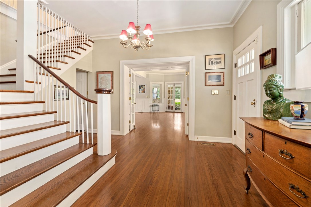 Own a piece of Rogers history! Built in 1904, this beautifully preserved home sits on 2.69 acres and was once the residence of O.L. Gregory and his wife, Atalanta, the very namesake of Lake Atalanta. Gregory donated the lake’s land to the city with one request: it be named in honor of his beloved, considered the most beautiful maiden in town.
Just minutes from Lake Atalanta, downtown Rogers, and Prairie Creek Marina, this historic gem offers 3,859 square feet of living space with 4 bedrooms, 2.5 baths, and timeless architectural details throughout. The property also includes a 937-square-foot carriage house with approved plans for a 1-bedroom, 1-bath guest suite and spacious great room—ideal for extended family, rental potential, or a private studio. The grounds are professionally landscaped and have beautiful mature trees. A rare opportunity to own a legacy property in the heart of Northwest Arkansas.