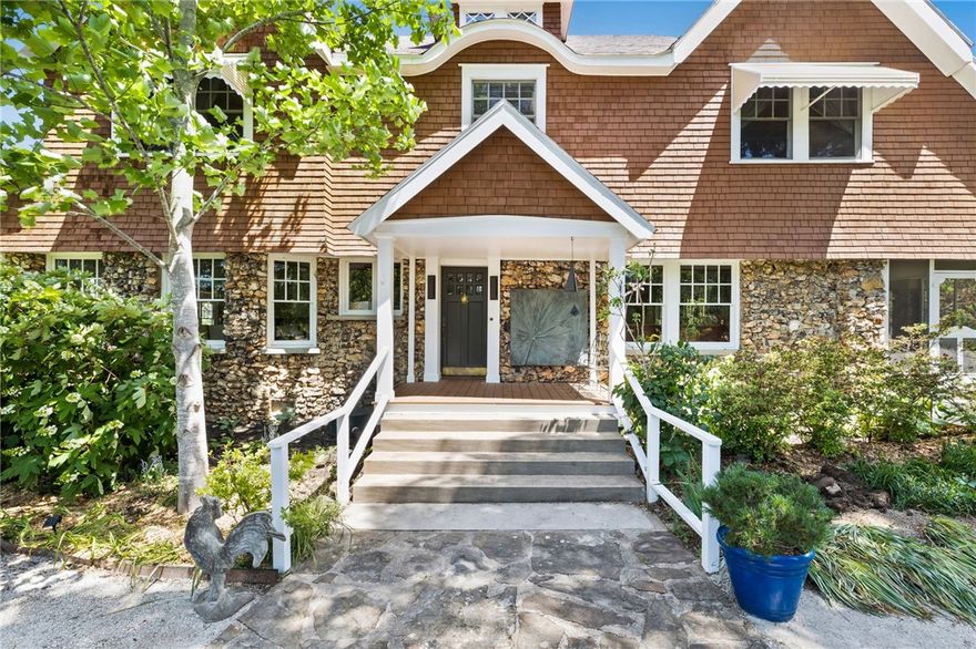 Own a piece of Rogers history! Built in 1904, this beautifully preserved home sits on 2.69 acres and was once the residence of O.L. Gregory and his wife, Atalanta, the very namesake of Lake Atalanta. Gregory donated the lake’s land to the city with one request: it be named in honor of his beloved, considered the most beautiful maiden in town.

Just minutes from Lake Atalanta, downtown Rogers, and Prairie Creek Marina, this historic gem offers 3,859 square feet of living space with 4 bedrooms, 2.5 baths, and timeless architectural details throughout. The property also includes a 937-square-foot carriage house with approved plans for a 1-bedroom, 1-bath guest suite and spacious great room—ideal for extended family, rental potential, or a private studio. The grounds are professionally landscaped and have beautiful mature trees. A rare opportunity to own a legacy property in the heart of Northwest Arkansas.
