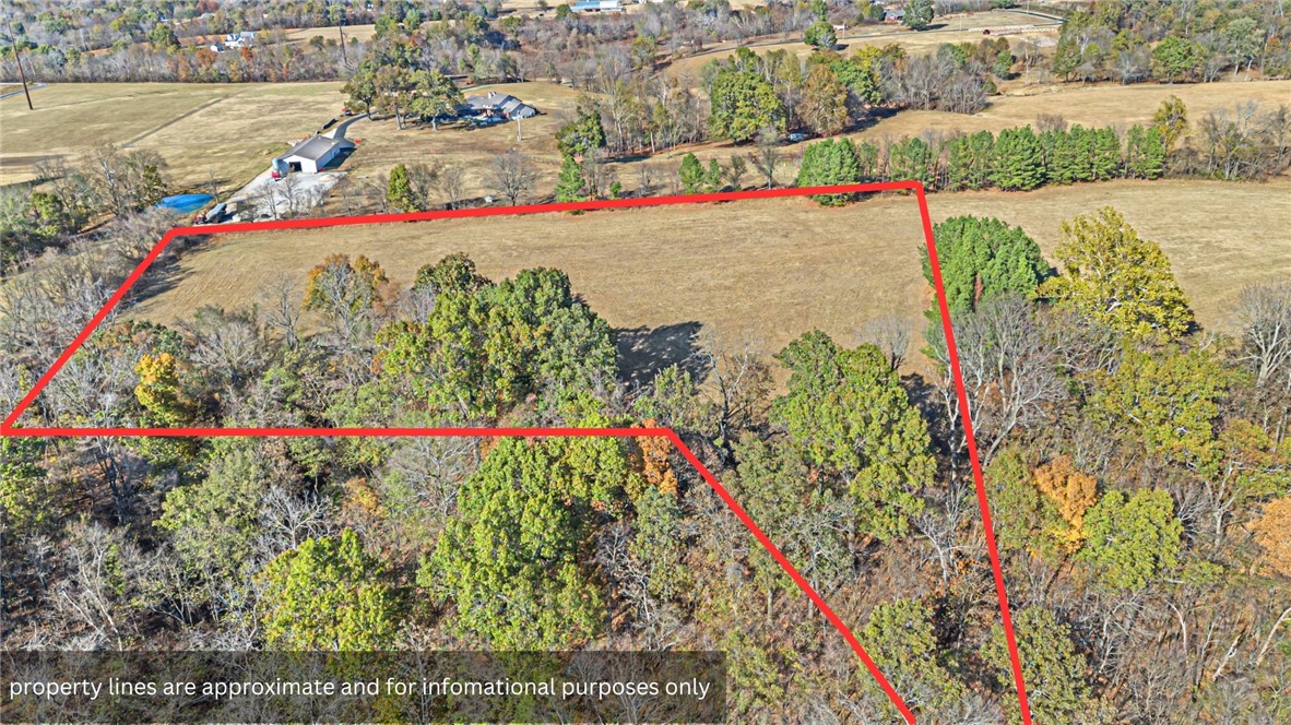This beautiful 5.71 acres of land features a picturesque hay pasture with ample open space, perfect for building a home or establishing a small farming operation. The property includes a scattering of mature, large trees, adding natural beauty and shade. Small, scenic views of the surrounding area give a peaceful and private feel, yet itās conveniently located close to Springdale and Fayetteville. This land combines the tranquility of rural living with proximity to city amenities.
Wildlife thrives here, with frequent deer sightings and other native animals, making it ideal for nature lovers. Whether youāre looking to develop a homestead, grow crops, or maintain it as a pasture, this versatile property is a great investment in the heart of Northwest Arkansas.