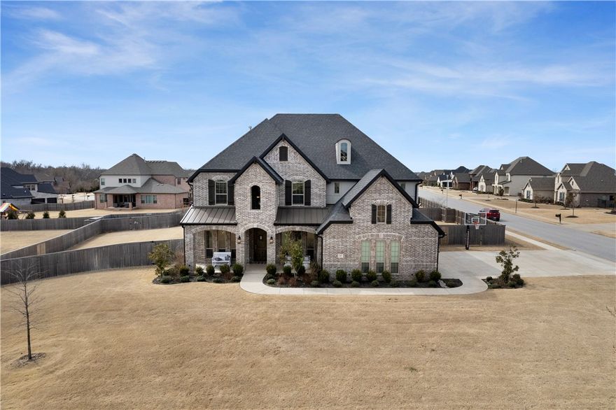 This 2021 built home is an expansive floor plan from the dramatic foyer to the family room with 20-foot ceilings! The kitchen is open to the breakfast area and family room, and leads through the butler’s pantry into a formal dining room. Across the foyer is a large office with beams. The first floor owners retreat includes a private bath and large walk-in closet. Upstairs you will find four bedrooms, two full baths, a bonus room, a media room! This home sits on a large corner lot, offers a 3 car garage, an outdoor fireplace, and plenty of room to install a pool if desired.  This one checks all the boxes! Open Houses both Saturday and Sunday 1-3.