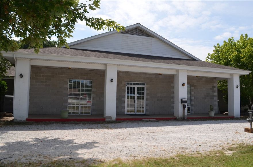 Prime Commercial Opportunity in Harrison. Discover incredible value with this 6,000 sq. ft. building offering endless possibilities at an affordable price. Located within sight of Hwy 62/65/412, one of Harrison’s busiest thoroughfares, this property provides outstanding visibility and accessibility. Inside, you’ll find: A partially equipped commercial kitchen with a six-burner gas stove, commercial refrigerator, dishwasher, and stainless-steel prep tables. Six private offices plus two storage rooms. A large open area, ideal for meetings, events, or retail space. This property does sit in a floodplain and the sale is subject to Harrison City Council approval. With its size, location, and versatile layout, this building is a blank canvas ready to bring your vision to life.