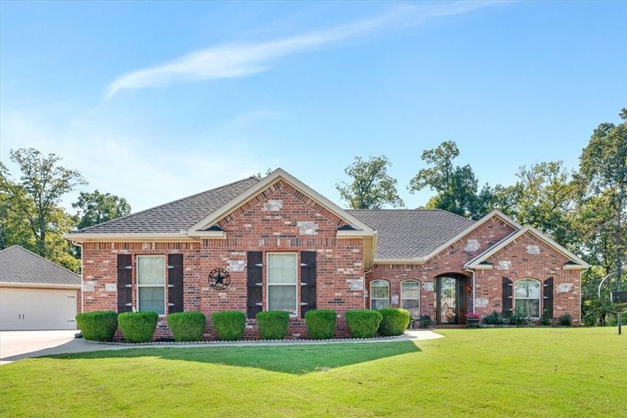 Rare Find! Experience refined living in this beautifully well maintained custom brick residence, perfectly positioned on a nature wooded 1+ acre lot at the end of a peaceful cul-de-sac. Just 10 minutes from downtown Siloam Springs, this home perfect balance of privacy, elegance, and convenience.
Step inside to discover impeccable craftsmanship throughout — featuring granite countertops, bespoke cabinetry, and rich hardwood flooring in hallway and living room. The thoughtful layout includes 3 spacious bedrooms and 2 well-appointed baths, designed for both comfort and style.
Car enthusiasts and hobbyists will appreciate the oversized 3-car attached garage and an additional 31’ x 25’ detached garage/workshop, ideal for extra vehicles, a boat, or creative workspace. Enjoy the natural wooded backdrop from your covered patio, perfect for outdoor dining or relax evenings surrounded by nature. A rare opportunity to own a luxury retreat with exceptional amenities in one of the area’s most sought-after settings.