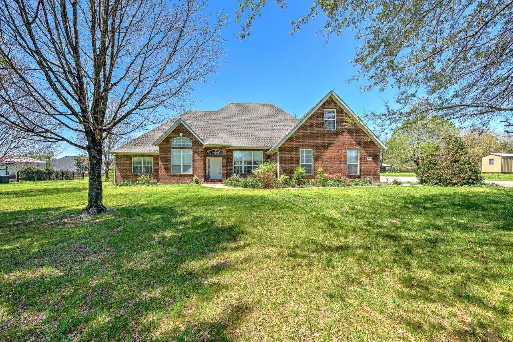 Back on the market! Peaceful country living in the middle of town! Home has 4 bed, 2.5 bath, & office. Hardwood floors, 12 ft ceilings & crown molding throughout. Detached 2-car garage with 280 sq.ft unfinished storage above.