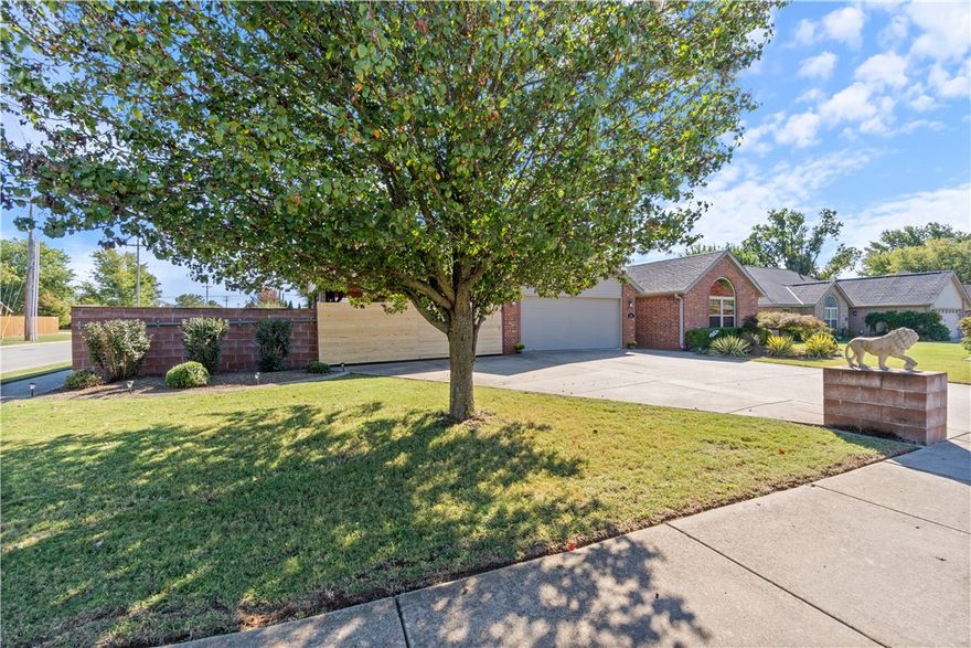 Here is your rare chance to own a beautiful, move in ready, corner lot home in a very desirable neighborhood! 2 blocks from the incredible 55 acre Osage Park and Lake Bentonville with archery, pickle ball, a dog park and nature preserve. https://peelcompton.org/osage-park. 2 blocks from many dining options, close to schools and just 1.7 miles to the Bentonville square. This home has many newer major updates. Roof (10/23) HVAC (6/19) New Windows (7/24) Garage door (7/20) All new kitchen with new cabinets, quartzite waterfall counters and new appliances (9/21). Beautiful woodgrain plank style ceramic tile throughout. Cozy fireplace and separate dining area. Pro landscaped yard with full block privacy wall surrounding your backyard. 2 car garage with 2 car covered, attached, gated carport gives you plenty of space for parking cars, boats, etc. Quiet street with easy access to most anything you'd want. Don't let this one get away!