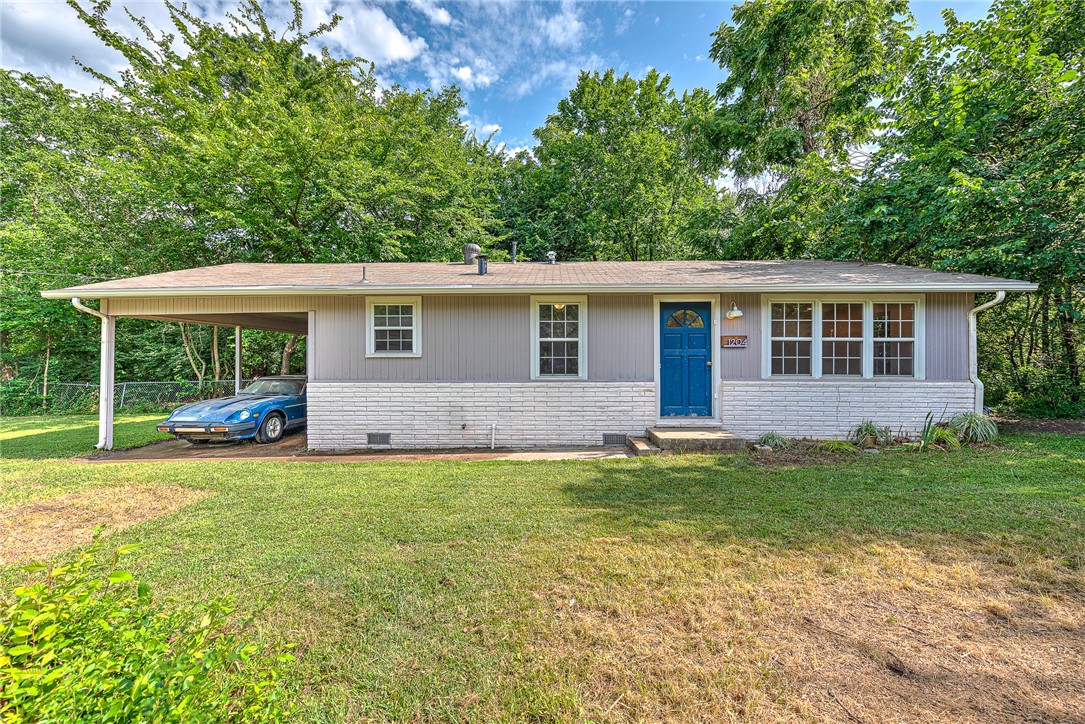 This cute, mildly renovated home is one you don't want to miss. This 2 bedroom, 1 bathroom is located with easy access to most of what Fayetteville has to offer. Blocks away from the UofA, Lewis Park, shopping, local restaurants and Hwy 49. Situated at the end of a dead end street and surrounded by mature trees make it seem like you are not in the city. This home sits on a fairly good sized lot with plenty of space between you and your few neighbors. Schedule your showing today. Agent owned.