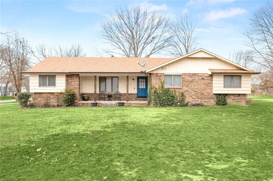 Welcome to this charming 3-bedroom, 2-bathroom home set on a spacious 0.77-acre corner lot in an established neighborhood just outside the Rogers city limits. Located within the Rogers School District, this 1,669 sq. ft. property offers a comfortable layout, a oversized, two-car garage, and a fenced backyard ideal for pets or outdoor living. Built in 1981 with classic brick and wood siding, the home also includes a small storage shed and a peaceful, country feel while still being close to town conveniences.