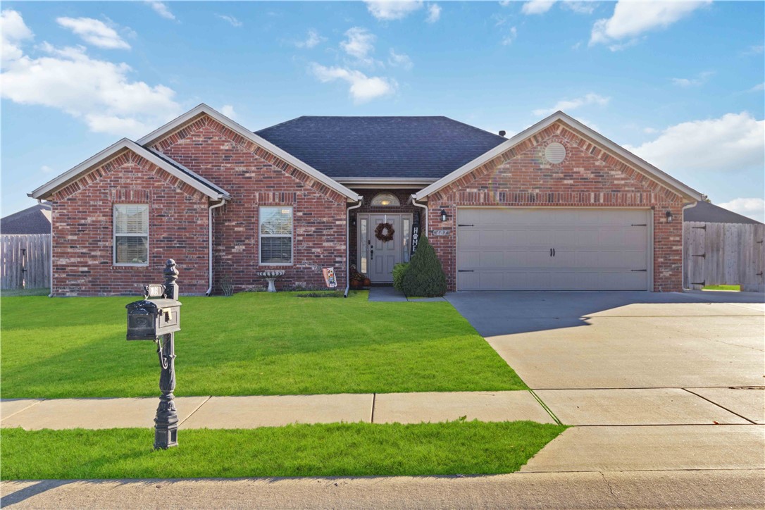 Don't miss this great value in a quality-built all-brick home! Featuring stunning scraped hardwood floors in the living area, new carpet in all bedrooms, an oversized garage, granite countertops, stainless steel appliances, a vaulted cathedral ceiling, HVAC replaced in 2022 and new roof in August 2024. Concrete pad for your 3rd car and extra concrete added on to the patio in the back. This charming 3BR/2BA home in Pea Ridge offers a spacious kitchen with ample cabinet and counter space, an open family room with a cozy fireplace, and a large, fenced backyard perfect for outdoor living under the covered patio with a firepit in the yard. Conveniently located near shopping, schools, and just minutes from Bentonville! You will want to schedule a showing for this one. It won't last long.