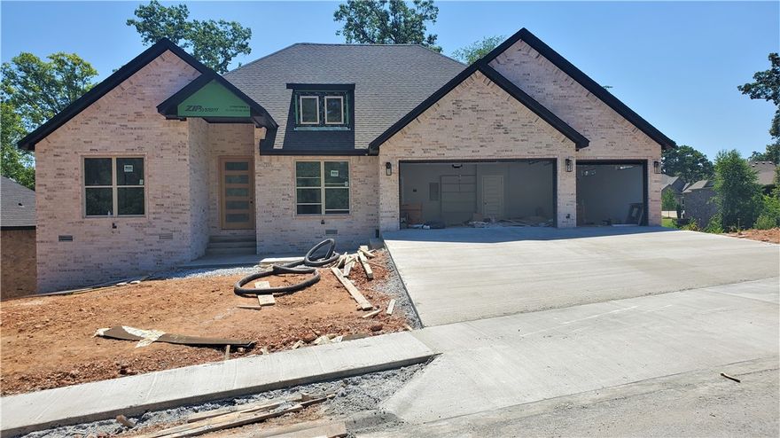 The finest house in the most amazingly kept secret beautiful subdivision in NWA.  House is built to be the premium quality & envy of all your neighbors.  Back deck off both the main level & lower walkout basement level which look mostly on beautiful mature trees.  Premium appliances, not just builder grade.  Every detail is top notch. 

2 houses down from the pool.