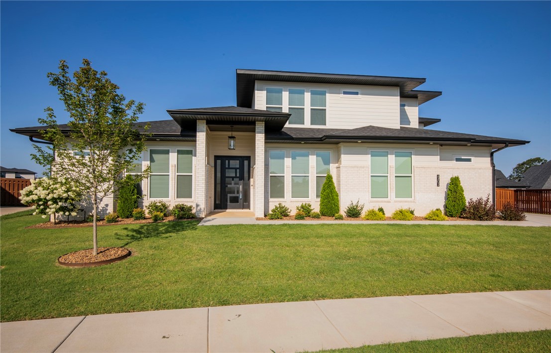 Stunning beauty in the coveted and gated Scissortail neighborhood! Modern-style home with plenty of room for everyone to spread out and even a huge bonus room. Beautiful features like wood drop-ceiling in the dining area, custom wood beans in the study, and wood ceiling in entry. Multiple windows throughout the kitchen and living room lend lots of natural light and view of the backyard. Primary bedroom is large and includes a sitting area and private covered patio. Spacious covered patio with built in grill that is perfect for relaxing and hosting!