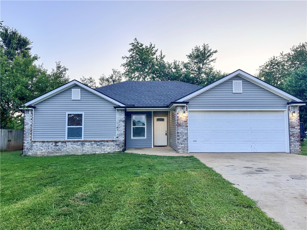 Nestled on a spacious corner lot, this 3 bed 2 bath home boasts mature apple and fruit trees, offering a unique blend of nature & neighborhood living. Enjoy the ease of access to I-49 & AR 265 while being a short walk from Ward Nail Park in Lowell - perfect for outdoor lovers & families alike. Don't miss this opportunity to rent a home that combines location, charm, & functionality!