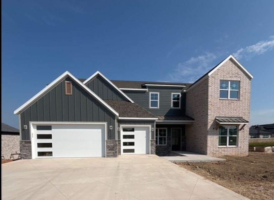 Experience modern elegance in this stunning 4-bedroom, 3.5-bath residence offering over 3,300 square feet of thoughtfully designed living space. The gourmet kitchen is adorned with quartz countertops, high-end Energy Star appliances, and a spacious pantry, creating the perfect setting for entertaining. Sophisticated details, including built-ins, a linear gas fireplace, soaring ceilings, and wide-plank flooring, bring a refined warmth throughout the home. Retreat to the spa-inspired bathrooms featuring walk-in showers, a freestanding tub, and sleek finishes. Enjoy effortless indoor-outdoor living with a covered patio and a dedicated outdoor space. With a 3-car garage, large flex/game room, and energy-efficient features, this home seamlessly blends luxury with comfort and convenience. $5,000 Preferred Lender Credit