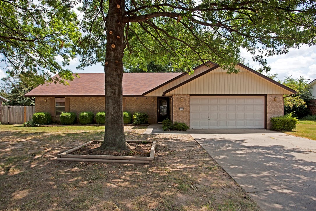 Great location just minutes from I-49. 3 bedroom 2 bath home has fresh paint throughout, laminate flooring in living room, tile in wet areas and carpet in bedrooms. Wood burning fireplace in living room. Fenced yard and covered patio and storage shed.