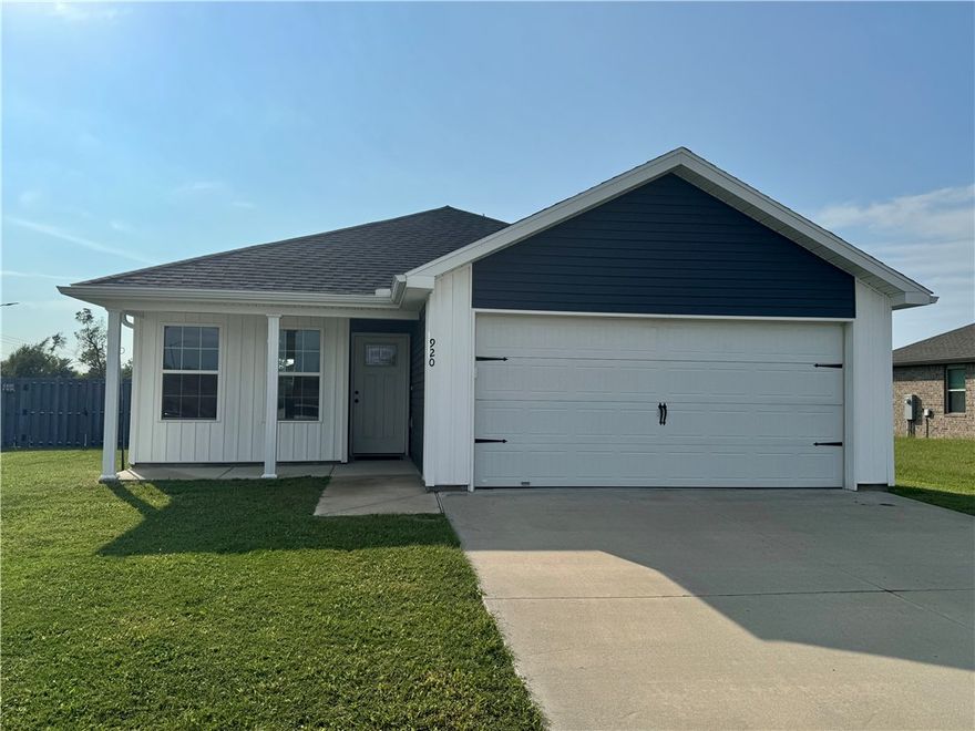 Check out this beautiful 3 bedroom, 2 bathroom home with 2-car garage on a corner lot in Siloam Springs. Built in 2021, this property offers modern style with an open floor plan perfect for everyday living and entertaining. The kitchen features a large island with eating area, granite countertops, and stainless steel appliances. The primary suite includes a walk-in closet and private bath, while both secondary bedrooms offer easy access to the guest bathroom. A convenient hall utility space provides for laundry needs and extra storage. Enjoy relaxing on the covered front porch or entertaining on the back patio overlooking the privacy-fenced backyard. Situated on a corner lot, this property offers great curb appeal, gutters, and great outdoor space. With its country feel yet easy access to Hwy 412, you’ll love being just minutes from restaurants, shopping, and all the conveniences of town. This home combines modern finishes, thoughtful design, and an excellent location at an awesome price point—making it a must see!