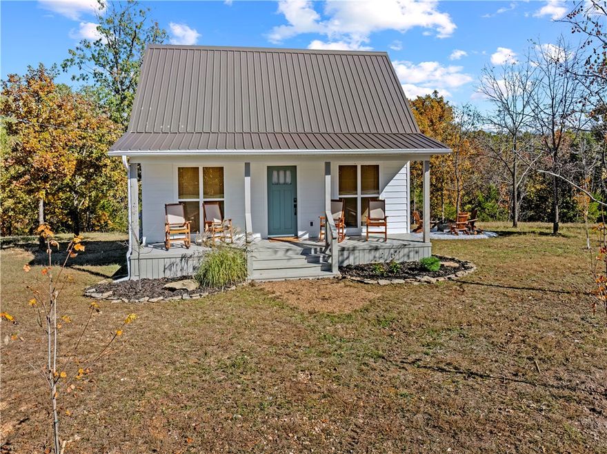 Escape to your own slice of the Ozarks with this stunning tiny home retreat on 4 acres m/l of peaceful, open land. Designed for simplicity without sacrificing style, this new construction offers the perfect blend of modern comfort and country charm. It is currently operating as a highly sought-after Airbnb! With it being close to the Buffalo River and creeks in the area it makes the property not just a getaway but an income producing opportunity! 

Inside you will find a thoughtfully designed space that can come fully furnished, with all appliances included- ready for you or your guests to walk in and feel right at home! Step outside and soak in the quiet beauty of nature, with nearby creeks and rivers offering endless opportunities for adventure, relaxation, and that true Ozark lifestyle buyers are chasing! Whether you are looking for a private escape, a turnkey investment, or both - this property delivers. Small footprint, BIG potential!