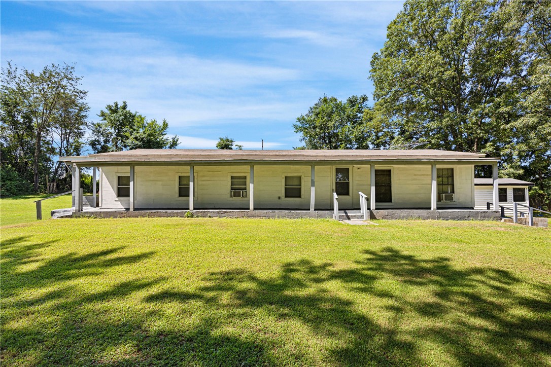 Prime Real Estate Opportunity – Commercial & Residential! Looking for the perfect blend of business potential and comfortable living? This unique 2-acre property has it all! Located in a high-visibility commercial potential, the front of the property features a fully functional shop with office space—perfect for your business, hobby, or storage needs. Tucked away at the back, you’ll find a cozy 2 bedroom, 2 bathroom home, offering privacy and peaceful living while staying connected to the action. Extras include: Several outbuildings for storage or projects, A 4-car carport for added convenience, Endless potential for expansion or investment Don’t miss your chance to own a versatile property in a prime location. Perfect for entrepreneurs, home-based businesses, or anyone looking for space to grow!
Call today to schedule your private showing.
