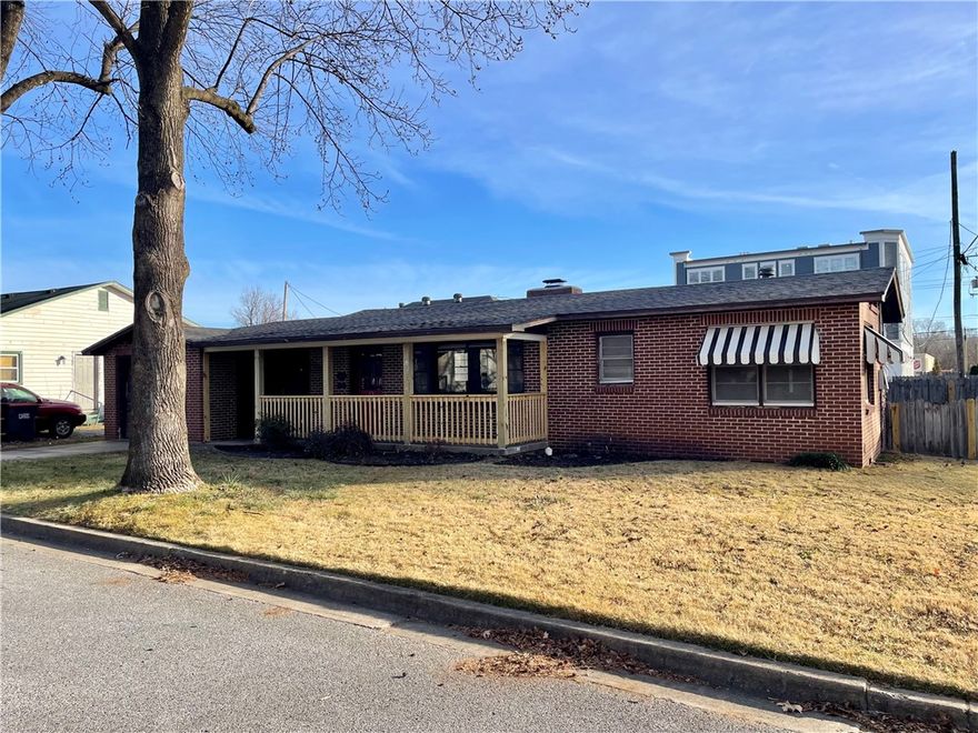 Opportunity awaits in historic Downtown Springdale! This property offers an open area suitable for reception, retail, or flexible workspace, plus two private offices, one with a separate entrance. Features include a kitchen, full bathroom, laundry/mud room, and additional storage in the converted garage (not included in square footage), ideal for equipment, bikes, or inventory. A new roof provides added peace of mind. Zoned for office or retail use and conveniently located near the Razorback Greenway, post office, fire station, restaurants, shopping, service businesses, and nearby mixed-use developments. The efficient layout, desirable downtown location, and attractive size and price point make this a versatile opportunity. Buyer to verify intended use with the city. Per the Springdale Planning Director, residential use may continue under grandfathered status provided use is continuous, vacancy does not exceed six months, and no changes increase nonconformity. Buyer to verify with the city to their satisfaction.