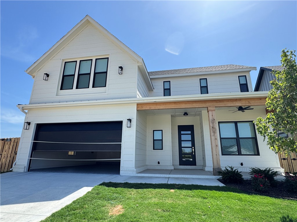 Welcome to Meadow Brook in SW Rogers! Great community in the best location! This plan features 3-4 bedrooms (2 flex spaces either bedroom 2 or study option as well as upstairs bedroom 4 or bonus room). All bedrooms have walk-in closets with plenty of storage! Downstairs you will find the primary bedroom. Great layout with open kitchen/living room area. Kitchen has large island to sit up to 6 bar stools, built-in gas cook top, built-in oven and microwave, large pantry, and eat in dining area. Primary bedroom feature en suite bathroom with soaking tub, walk-in shower, his and hers separate vanities, and large closet with lots of built-ins. Bedrooms 2,3 & 4/bonus room are upstairs along with a full bathroom. Enjoy the evenings grilling on the covered back patio! Can't beat location being only minutes to shopping, dining, groceries stores, and only steps to the Razorback Greenway Trail.