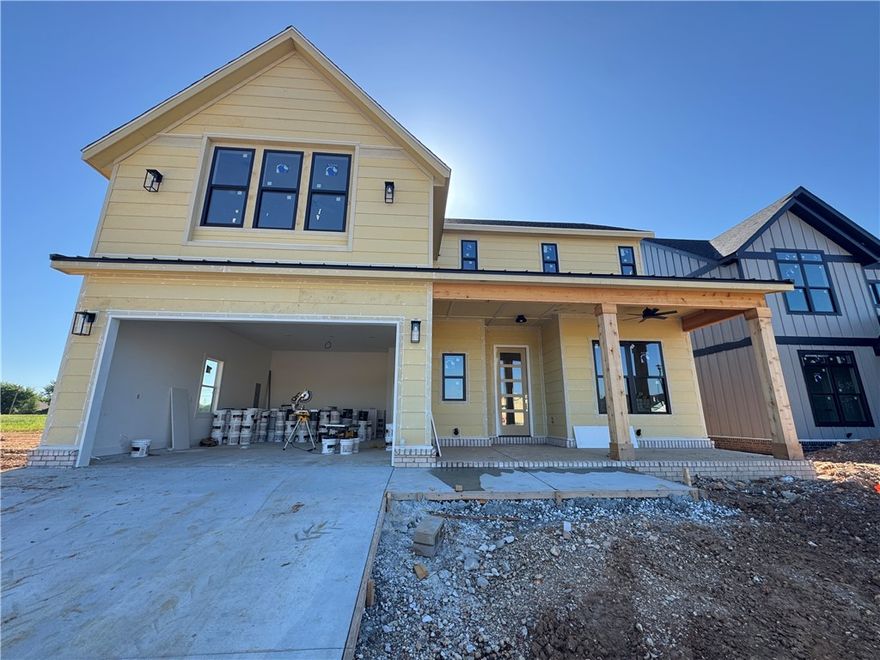 Welcome to Meadow Brook in SW Rogers! Great community in the best location! This plan features 3-4 bedrooms (2 flex spaces either bedroom 2 or study option as well as upstairs bedroom 4 or bonus room). All bedrooms have walk-in closets with plenty of storage! Downstairs you will find the primary bedroom. Great layout with open kitchen/living room area. Kitchen has large island to sit up to 6 bar stools, built-in gas cook top, built-in oven and microwave, large pantry, and eat in dining area. Primary bedroom feature en suite bathroom with soaking tub, walk-in shower, his and hers separate vanities, and large closet with lots of built-ins. Bedrooms 2,3 & 4/bonus room are upstairs along with a full bathroom. Enjoy the evenings grilling on the covered back patio! Can't beat location being only minutes to shopping, dining, groceries stores, and only steps to the Razorback Greenway Trail.
