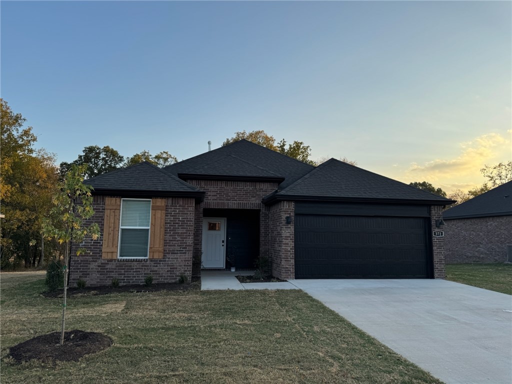 Delightful Denton plan in Goose Creek Village, the impressive subdivision where quality and affordability meet in the heart of Farmington. This home features gorgeous quartz kitchen countertops, stainless steel appliances and a walk-in pantry. (per plan) 42 inch upper cabinets with top molding and soft close cabinet doors. Private bedroom one includes a lovely en-suite with quartz counter tops, double sinks, over-sized shower and walk-in closet. Living room will showcase a beautifully modern Electric Fireplace with heater. Luxury Vinyl plank flooring throughout! Ceiling Fans! This home exterior will have 4 sides brick! Covered patio and a landscape package. Garage Door opener! Taxes and Parcel # TBD.