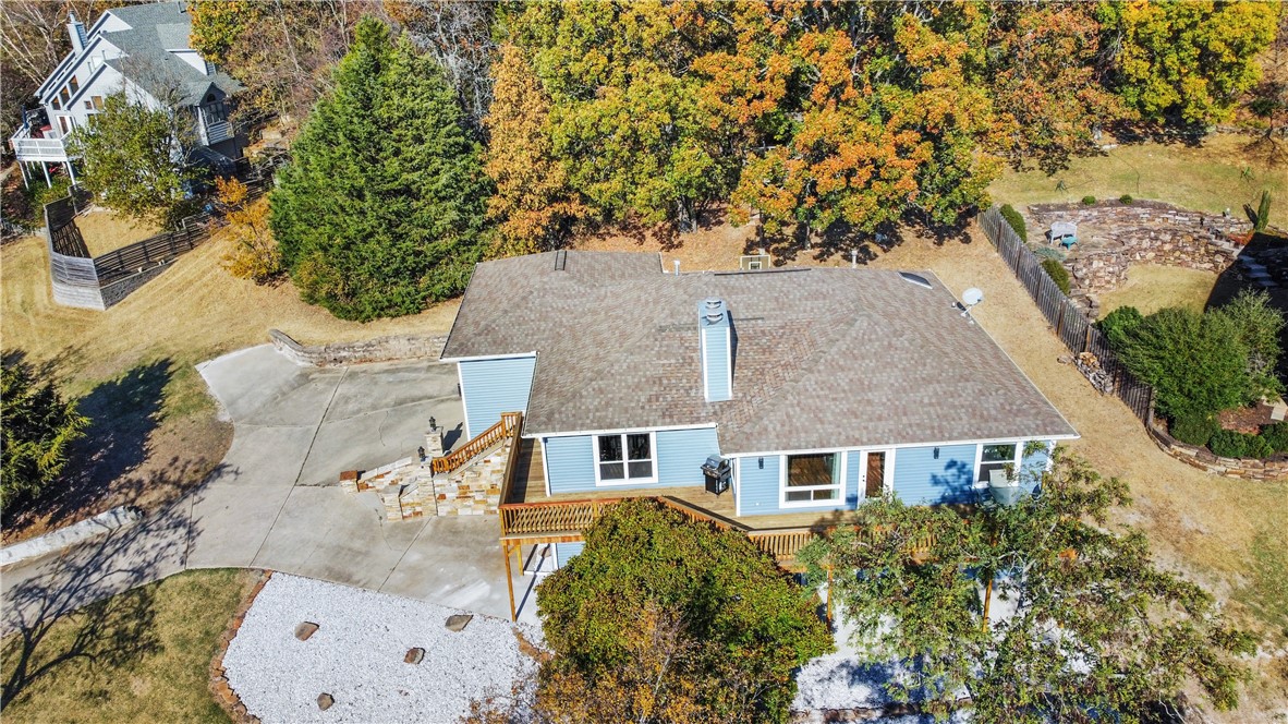 Welcome to 2841 Hyland Park Ave in Fayetteville, AR! This stunning two-story, hill-top home offers breathtaking views of the surrounding landscape. The spacious home features 4 bedrooms and 2.5 bathrooms, perfect for comfortable family living.
The interior showcases an updated kitchen featuring modern appliances. The flexible floor plan includes two living rooms each with a cozy fireplace, a formal dining room, and an office. A convenient kitchenette adds extra functionality to the downstairs living space.
One of the home's most striking features is its expansive wrap-around deck with covered porch underneath, providing the perfect vantage point to enjoy the spectacular views. Located close to vibrant downtown Fayetteville and Dickson Street, this home offers the perfect blend of peaceful mountain living with easy access to dining, shopping, and entertainment.
Don't miss this opportunity to own this fabulous East Fayetteville home.