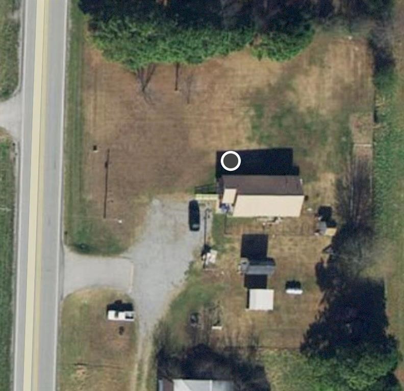 1 Acre fronts on Hwy 279 North, busy road frontage just off of Highway 102 West of Centerton. Great potential for commercial. Minutes from XNA regional airport. City water, septic and electric on site and at corner.