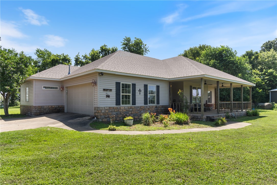 Rare opportunity to own 8.35 acres just minutes from Bentonville and Pea Ridge! This well-maintained 3-bedroom, 2-bath home features vaulted ceilings, granite countertops, and a functional split floor plan. Enjoy privacy, open space, and endless possibilities. Bring your animals, build, or simply enjoy the land. A 33'x20' barn/shop with a rolling overhead door offers additional storage or workspace. No subdivision restrictions. Ideal for buyers seeking land without compromising on location. Move-in ready with acreage thatās hard to find in this area!