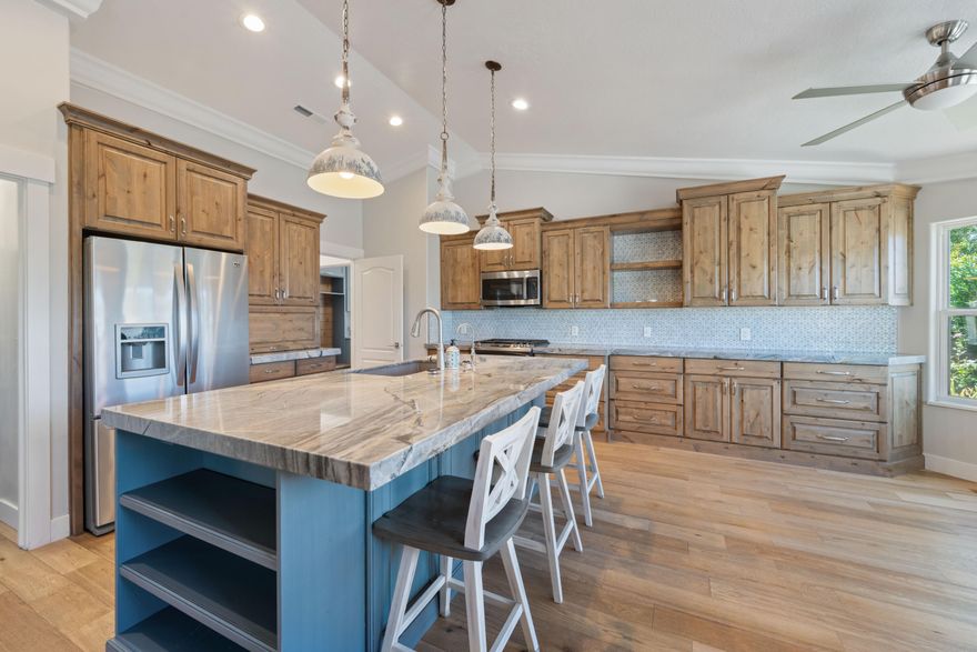 Beautifully remodeled just two years ago, this all-brick home blends timeless charm with modern updates. The stunning cabinetry, countertops, and flooring shine throughout. Plus tinted windows keep the home nice and cool. The kitchen features stainless steel appliances, including a convection oven and a microwave speed oven. Perfectly located in downtown St. George, you'll be within walking distance of shops, dining, and the hospital across the street. The back and side yard are very private with no neighbors behind you or to one side. HOA amenities include water, sewer, garbage, internet, pool, pickleball, clubhouse, and more. This home is both a stylish residence and a smart investment. 55+ Community.