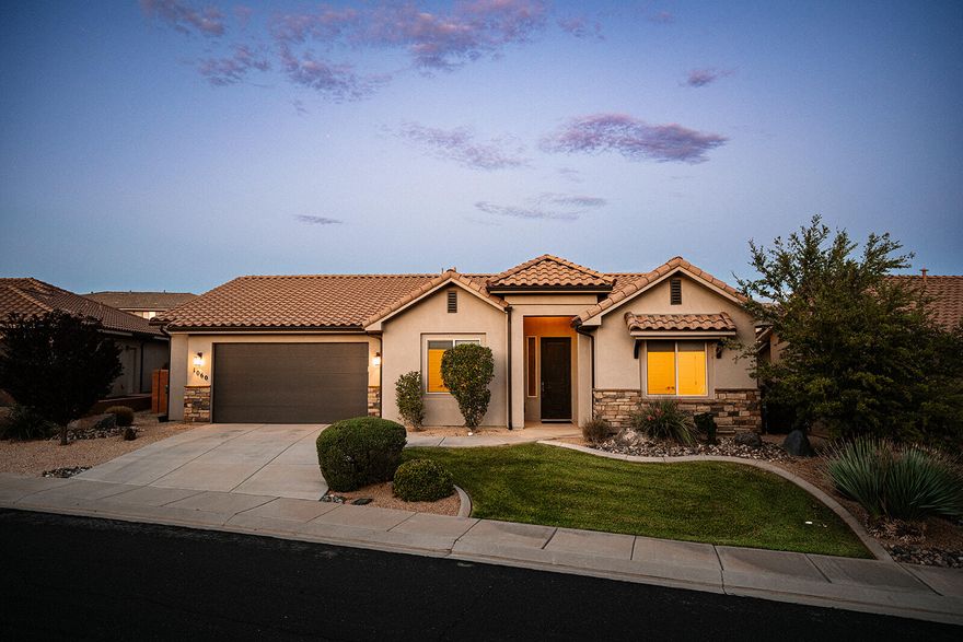 Welcome home to Single-level living at its finest! This beautiful home features clean lines and all the right upgrades. The kitchen is the heart of the home, featuring a large island with quartz countertops, rich cabinetry and clean modern lighting that pulls everything together. You'll love the spacious Primary Suite with a beautifully tiled walk-in shower, fabulous black plumbing fixtures and a huge walk-in closet. Outside, you're right where you want to be in the heart of St. George, near hiking and biking trails and picture perfect landscapes. Don't miss your chance to call this home yours.
