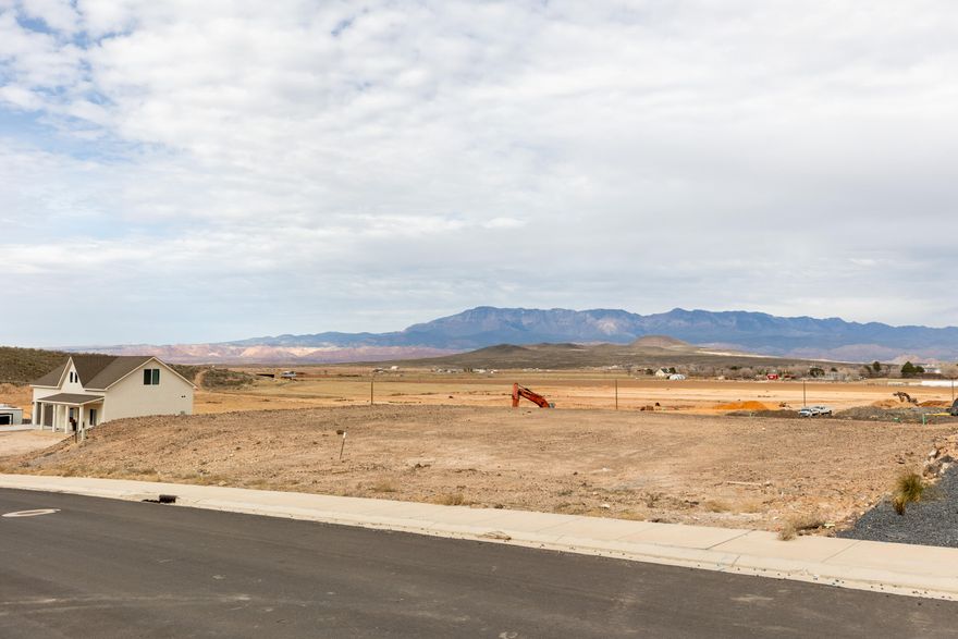 Beautiful lot in an awesome newer subdivision near Copper Rock Golf Course. No HOA, and spectacular Views. Plenty of space for RV garage & parking. Close to trailheads and outdoor recreation. (Golf, Sand Hollow Res. Zion, hiking, biking, & ATV fun). Bring your own builder to create your new dream home!