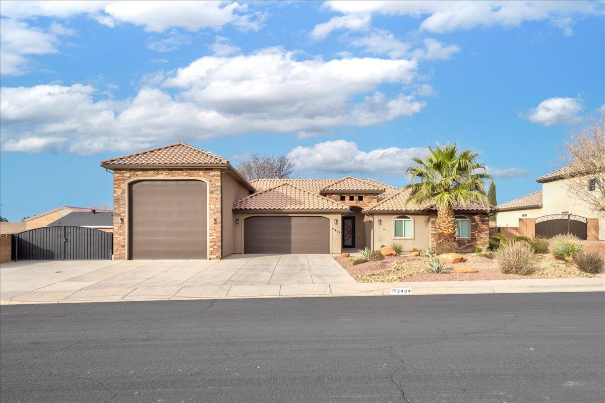 A true Desert Oasis with No HOA!  Featuring an oversized RV Garage and In-Ground swimming pool, this home is sure to impress!  2,800 sq/ft all on 1 level.  The home boasts 5 bedrooms and 3.5 bathrooms and is fully upgraded.  Greeted by a custom 8 foot iron door, the raised entry welcomes you into an open living room & kitchen that is ideal for entertaining.  The oversized master bedroom & bathroom feature double vanities, a large custom walk-in tile shower, a jetted tub & double master closets!  The home is fully upgraded with granite counter tops, tile floors, water softener, RV parking, 2 HVAC units, Solar Tube, Exterior shed/workshop, Gas stub for BBQ, and much more. RV Garage Door is 14 X 14. Ceiling height is 16 feet.   RV Garage depth is 45 feet.  50 amp RV outlet in Garage. 
RV parking / Concrete pad on side of home is 42 feet long.  Gate is 18 feet wide.  2 sewer clean outs on side of home along with 220 power. Plenty of room to park the toys / trailers. 
Exterior shed with power is 20 X 10. 
Covered patio is 22 X 15.