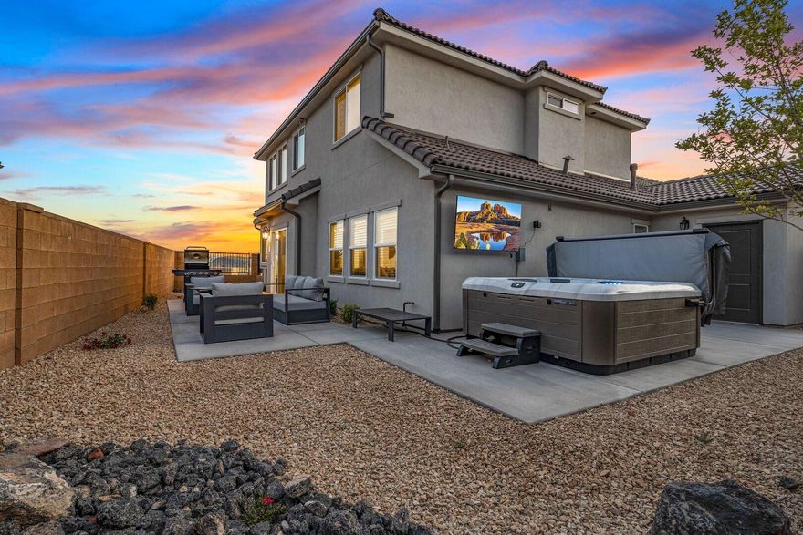 It's not just a rental, it's your place. Own your family's Zion-area vacation home, escape here whenever you want, and let it work for you when you're away.
Step inside this fully furnished retreat built for real experiences and unforgettable family time. With 4 bedrooms, 3 full bathrooms, and a dedicated bunk room featuring 3 bunk beds, there's space for everyone to spread out while still feeling warm and connected. Nights are meant for soaking in the private hot tub under the stars, gathering around the fire pit, friendly ping-pong competitions, and easy movie nights with TVs in every bedroom.
Beyond the front door, the community feels like a resort, complete with a heated pool and giant slide, a lazy river, and two pickleball courts. Spend your days at Sand Hollow Reservoir boating, paddleboarding, and chasing desert sunsets, or head to Zion National Park just minutes away, where every trail feels like a once-in-a-lifetime adventure.
Thoughtfully finished and owner-enjoyed, this home offers something rare: a true vacation retreat that still gives you the option to rent it out on your own timeline.