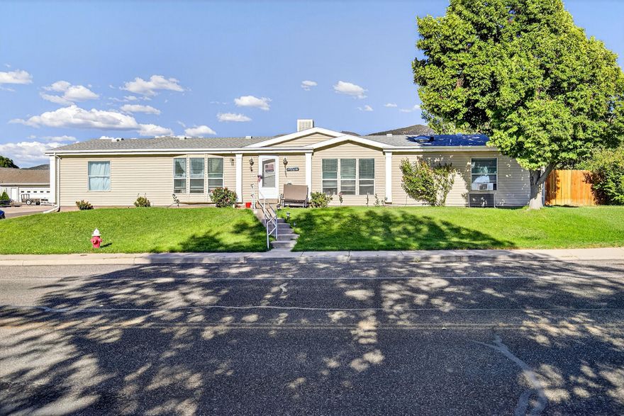 This wonderful family home features six bedrooms and two baths, providing ample space for a growing family or hosting guests. The conversion of the garage into two additional bedrooms adds 500 square feet to the home, offering even more living space with a total of 2628 sq ft. The open living area with vaulted ceilings creates a bright and airy environment, perfect for family gatherings. The large, fenced-in backyard and patio area and storage shed out back, offer a private space for outdoor activities and relaxation. Additionally, the home's proximity to local schools and parks ensures easy access to community amenities.