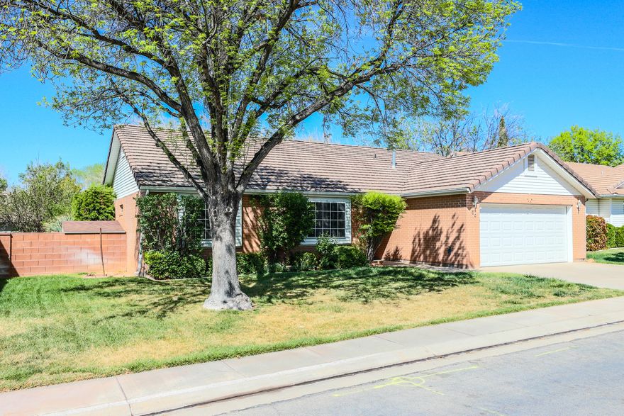 Come see this charming home tucked away in Creekside homes quite tree lined streets.
this home has a great covered patio to enjoy your afternoon or evening meal. just a short walk to the pool. Convent location to shopping, dinning, hiking, bike trails and all St George has to offer. This 3 bed two bath plus a bonus office with updated A/C and water heater will make its next owner a great place to call home.