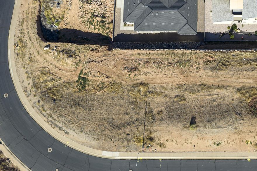 Corner .27 acre lot, conveniently located in La Verkin just minutes from Zion National Park. Offering walk-out basement potential, this affordable building lot provides the perfect opportunity to build in Southern Utah without the burden of HOA fees. Tucked into a relaxed neighborhood, you will enjoy sweeping views of the valley and surrounding red rock mesas without paying premium resort prices.