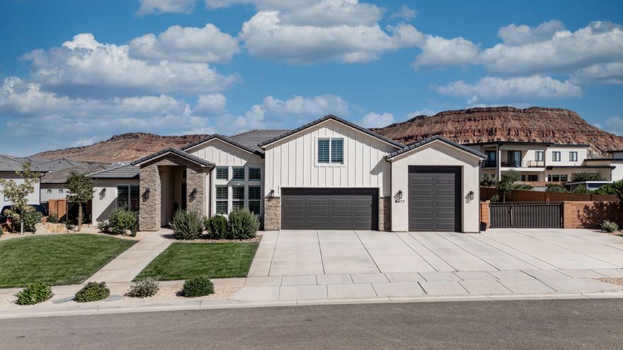 This Washington Fields home offers overs 3,400 sq ft with 4 bedrooms, 4.5 baths, an office & a large upstairs bonus room with extra storage. The split layout puts the primary suite on one side & guest bedrooms with en suites on the other, plus an additional bedroom & bath upstairs. Custom, solid, real wood cabinets run throughout, giving the home lasting character. The garage is finished with epoxy flooring, ceiling fans,  & a mini split, making it as usable as any other room. Outside you'll find a big backyard with lush grass, a covered patio, everlights & low maintenance landscaping. A short drive to Sand Hollow. With an oversized RV garage, generous side parking, within Crimson High & Dixie Power boundaries, this home combines space, function & upgrades in one of the best neighborhoods The layout is balanced with the primary suite on one side & guest bedrooms with en-suites on the other. Upstairs includes another bedroom, a full bathroom, & a bonus room with built-in storage. 

Several rooms open directly to the backyard, including the dining area, a guest suite, & the primary suite.

The entry is bright with tall ceilings & an iron front door that has a screen so you can let in fresh air. Right off the entry, a home office with built-in cabinetry provides a dedicated workspace. The kitchen has custom cabinetry throughout, along with a hidden pantry designed like a full second prep area. Inside are built-in shelves, counters, a refrigerator, microwave, & plenty of storage. Under cabinet lighting brightens the kitchen, & just off the back garage door there's a built-in drop zone with a desk for everyday organization.

Storage is built into nearly every corner of the house. There's space under the stairs, extra storage near the kitchen, cabinetry throughout the home. The upstairs bonus room includes storage as well, making it easy to use the space as a theater, playroom, office extension or gym without feeling crowded.

The garage is finished with epoxy floors, ceiling fans, AC & a mini split so it stays comfortable year-round. On the back side of the garage there's also an outdoor storage closet, also finished with epoxy floors, for bikes, gear or tools. Between the oversized RV garage & wide side parking, there's more than enough space for vehicles, trailers or RVs.

The RV Garage door width = 10 feet, height = 12 feet, & depth = 34.5 feet.

The RV parking on the side of the house:
Gate opening = 13.5 feet
Cement Slab (wall to wall) = 35.5 feet
Cement Slab Depth = 29.5 feet
Additional Rocked Area Depth = 25 feet
Total Cement + Rocked Area Depth = 54.5 feet

Comfort is built into the design. Carpeted areas have upgraded memory foam padding that feels soft underfoot. The laundry room connects directly to the primary closet, which makes daily routines easier. Every guest room has its own bathroom, & one suite even includes extra storage in the bathroom closet.

Outside, the front yard has low-maintenance beautiful landscaping while the backyard has enough lush green grass to let everyone run and play.

A covered patio provides shade & room for gatherings. The home includes Everlights, giving you permanent programmable lighting year-round without extra work. At the entry, a water feature adds a simple, but welcoming detail. Sliding screen doors on exterior doors make it easy to open the house up to fresh air, & a custom dog door was built into the plans for "all of" your furry family members to "zip" in and zip out!

Custom cabinetry, real wood finishes, thoughtful lighting & built-ins are consistent throughout the home. From the hidden pantry to the office cabinets, from the drop zone to the storage closet behind the garage, everything feels like it was designed to make life easier and function smoothly.

The location is great in the heart of Washington Fields, which is known for being a well cared for area with great people, & this neighborhood is within Crimson High boundaries. The home is also served by Dixie Power. It's close to parks (the brand new one under construction), trails & shopping, yet the neighborhood stays quiet & peaceful.

With quick access to Highway 7, you're never far from everything Southern Utah is known forgolfing, hiking, biking, boating & off-roading are all just a short drive away.

With its split floor plan, en suite guest rooms, multiple outdoor access points, finished garage, custom cabinetry, storage throughout, upgraded finishes, large RV garage & prime location, it's a house that feels homey, well thought out & easy to enjoy every day.

Furniture is available to purchase, sellers agent will supply a full detailed list upon request.