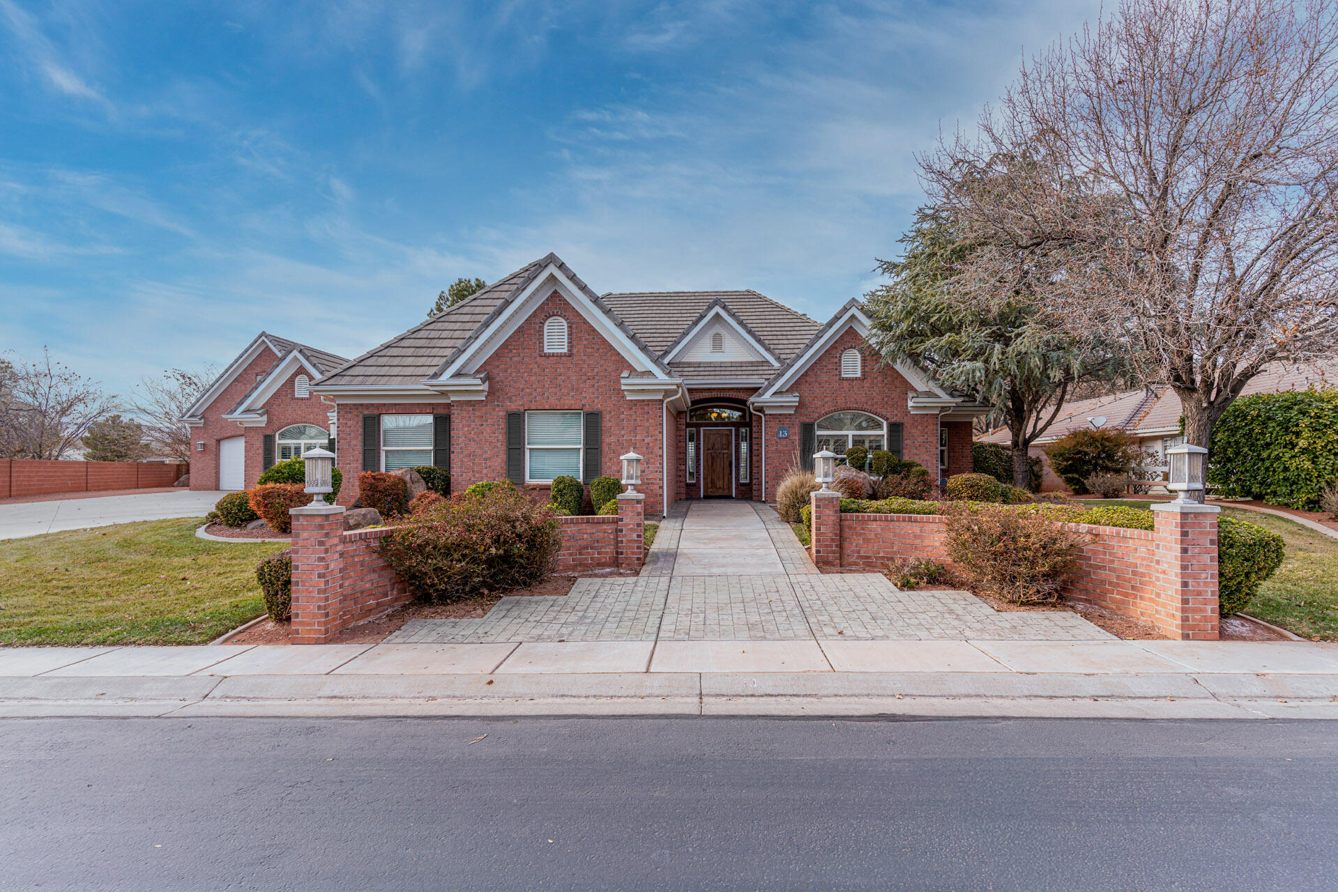 This home has everything you've been looking for & more! Located in a gated neighborhood that everyone loves for its privacy & charm.

This beautiful brick tudor style home is a perfect blend of timeless character & detailed craftsmanship. The meticulously landscaped yard is framed by mature trees & manicured bushes offering an inviting curb appeal that sets the tone for what you'll find behind the front door.

Come inside & you'll immediately notice the details that make this home so special. Rich hardwood floors flow through the main living spaces, all the details on the ceiling add so much warmth & richness. 

Big windows let in plenty of natural light, & the layout is super livable! With intricate details and thoughtful design elements, this house is truly one of a kind! The generous 1/2 acre lot with its huge yard, pool, hot tub, sports court, & garden area makes it a private retreat you'll never want to leave! So invite your friends and family over and get ready to enjoy life behind the gates at Pheasant Run! 

The living room is an absolute showstopper, boasting a grand fireplace with a wood mantel that serves as the centerpiece of the space. The detailed wood trim from floor to ceiling and the views to the backyard all add to this beautiful formal living room. 

The kitchen, dining, and family rooms are equally impressive, featuring timeless cabinetry, stone countertops, and a layout designed with both functionality and style in mind. The adjacent dining area is perfect for hosting family gatherings or intimate dinners, with doors that open to a private patio for seamless indoor-outdoor entertaining. The family room has beautiful wood ceilings and a built-in entertainment center, so you can enjoy everyone all at once in this well-thought-out space. 

The primary suite, located on the east wing of the house, is private and relaxing. With a double-sided fireplace, jetted tub, walk-in shower, double sinks, and walk-in closet, it feels like an upscale hotel getaway! 

The home office is conveniently located just to the right of the front door and can be closed off for privacy. Get right to work at the built-in desk area, or grab a book and relax in this cozy room. 

The basement has a comfy theatre room that seats everyone! And you may feel inspired to watch Alice in Wonderland after going into the themed playroom with glow-in-the-dark paint! Things are getting "curious and curiouser" as you explore this custom play space under the stairs! 

The downstairs also features two spacious bedrooms with walk-in closets and a full bathroom, providing plenty of room to relax and enjoy the space.

The prepper in you will love the large storage room, complete with water tanks and solar-powered pumps, ready to provide peace of mind should the need ever arise.

The spacious detached garage offers a workspace and plenty of room to park extra cars and toys. Upstairs, you'll find a private apartmentperfect for extended-stay guests who you want nearby but not too close. This flexible space could also serve as a home office, a retreat for married kids, a mother-in-law apartment, a game room, or even a workout area. The possibilities are endless!

This backyard offers plenty of space for both relaxation and activity. The pool with a water slide provides a great spot to cool off, while the hot tub is perfect for unwinding. The sport court is ready for basketball or pickleball games. The large covered patio offers shade for outdoor gatherings, and a gardening area provides space to grow your own plants. The backyard is a great setup for both everyday use and entertaining.

Outside this remarkable property, the gated community provides a private and secure lifestyle. The neighborhood is known for its charm, offering a peaceful setting with tree-lined streets and well-kept sidewalks. Conveniently located, it's close to top-rated schools, shopping, dining, and entertainment, making it a great place to call home.

What makes this home unique is its ability to combine timeless charm with modern possibilities. The craftsmanship and attention to detail are evident, yet the home offers a blank canvas for your creative vision. Imagine pairing modern fixtures with the warmth of the original woodwork or using minimalist furnishings to highlight its architectural details. The options are endless, allowing you to create a space that feels both classic and contemporarya home that truly reflects your style.