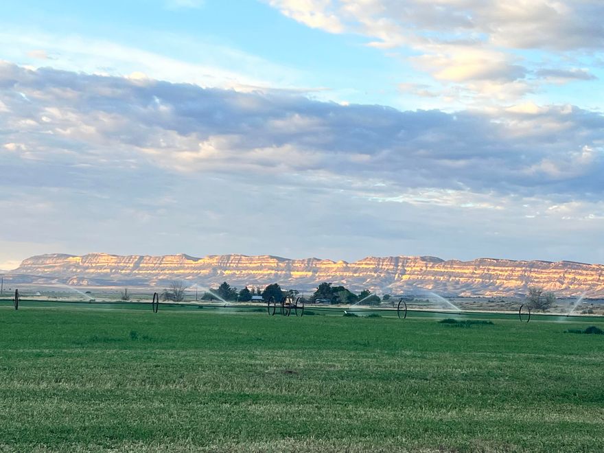 This magnificent piece of ground offers the rare opportunity to to build your custom home with a front row view of sunrise and sunset on the ''Fifty''- the golden range that runs parallel to the iconic Hole in The Rock Road in the heart of the Escalante Grand Staircase National Monument. More than just land, this property boasts 15 shares of water- a limited resource with ever increasing value! Also included is a 1,000+ foot wheel line with power mover. Don't miss your chance to own a piece of ground in one of the most beautiful places in America.