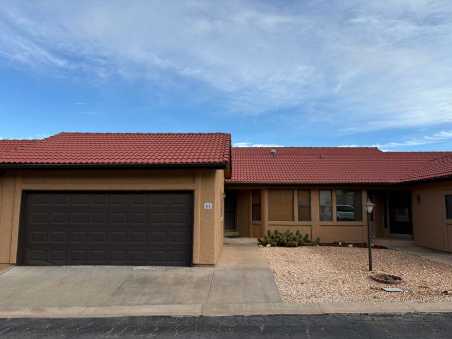 Discover comfort, convenience, and incredible scenery in this charming 2-bedroom, 2-bath, 2 car garage condo located in the heart of St. George. Featuring an open, spacious floor plan, this residence is designed for easy living and effortless entertaining. The kitchen shines with granite countertops, upgraded stainless-steel appliances, and ample cabinetry, perfect for cooking and gathering. Enjoy the added convenience of in-unit washer and dryer, along with ceiling fans throughout to keep the home cool and comfortable year-round. Step outside and take in one of the best panoramic views of the city and surrounding red-rock mountains, a truly stunning backdrop morning and night with nearby hiking and biking trails.