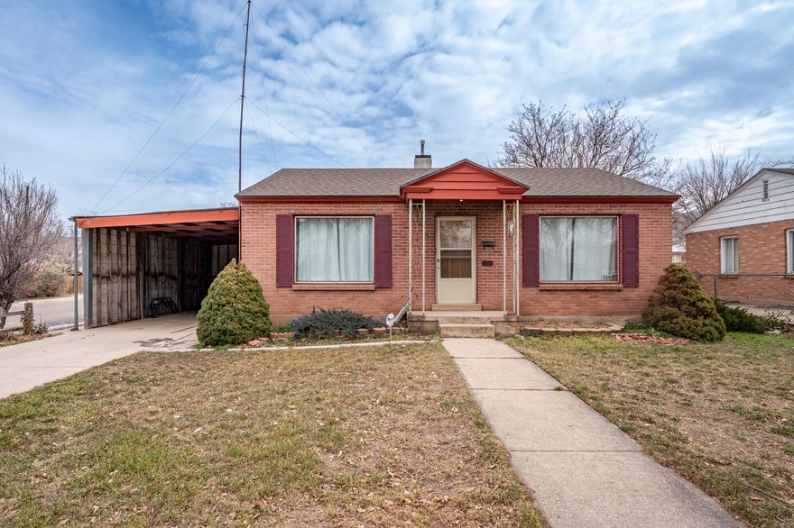 Prime investment opportunity near Southern Utah University! This 2,044 sq ft home sits on a .18-acre corner lot just minutes from campus. Featuring 3 bedrooms and 1 bathroom upstairs, plus 2 bedrooms and 1 bathroom downstairs—with potential for a 6th bedroom—this property offers flexibility for rental income or a growing household. Enjoy a full yard, multiple storage sheds, and a carport for covered parking. Convenient location with nearby amenities and endless potential.